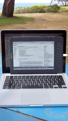13" MacBook Pro with E Ink screen kickin' it beachside